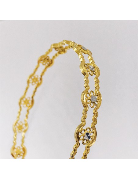 Esclava en oro 18kt con flores.