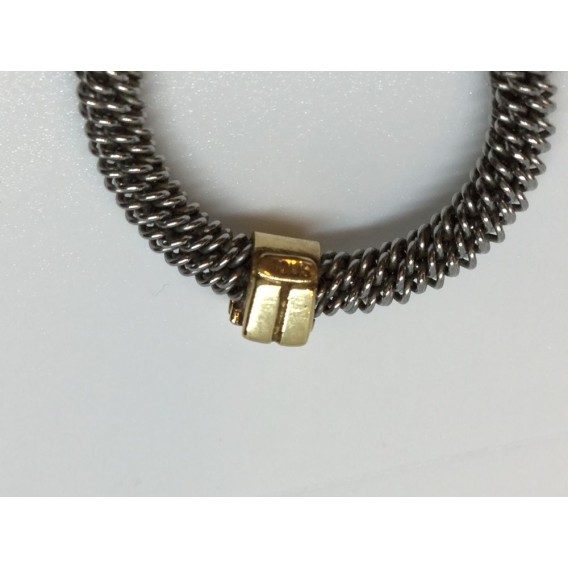 Sortija Tous en acero y oro amarillo y figura niÃ±a