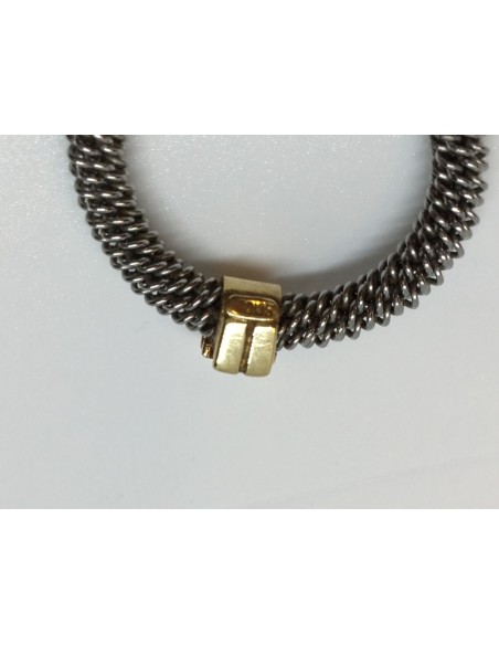 Sortija Tous en acero y oro amarillo y figura niÃ±a