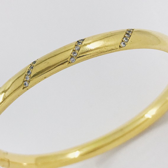 Pulsera esclava en oro 18kt. con brillantes.