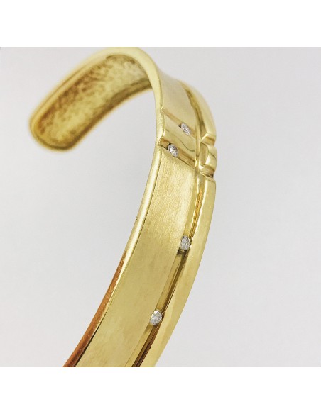 Esclava en oro 18kt. con brillantes.