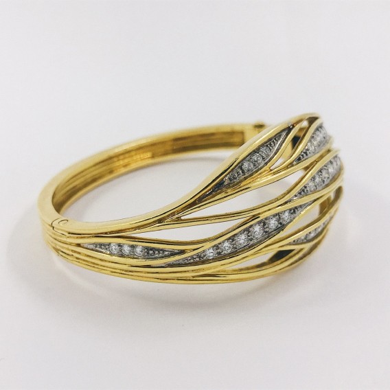 Pulsera esclava en oro y brillantes