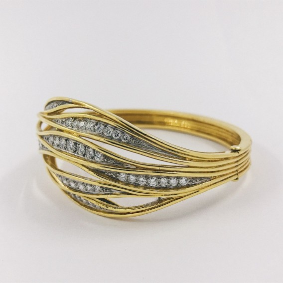 Pulsera esclava en oro y brillantes