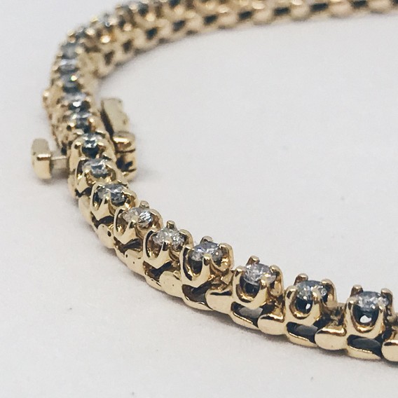Gargantilla riviere en oro 18kt con brillantes.