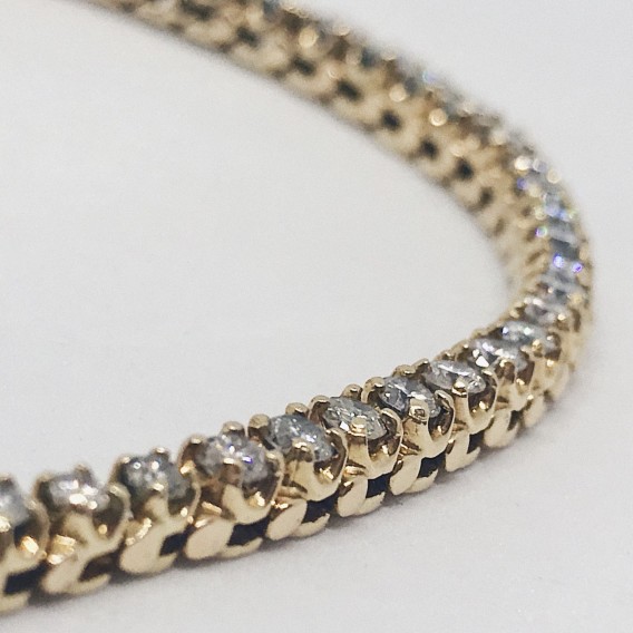 Gargantilla riviere en oro 18kt con brillantes.