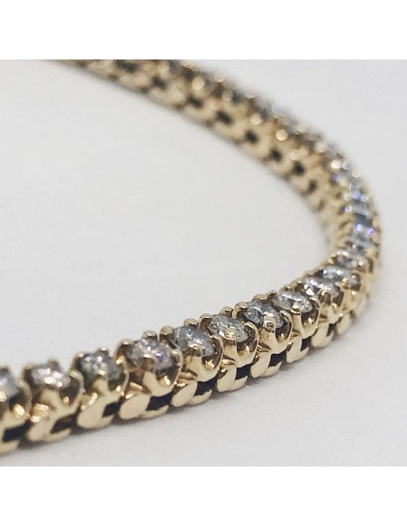 Gargantilla riviere en oro 18kt con brillantes.
