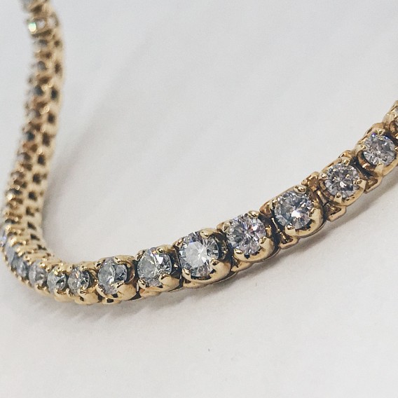 Gargantilla riviere en oro 18kt con brillantes.