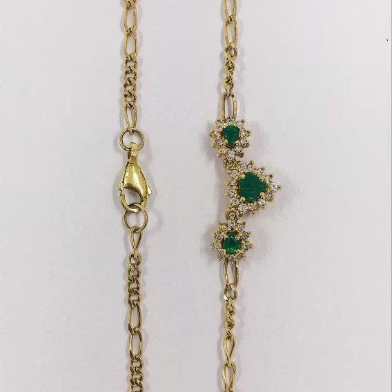 Gargantilla en oro 18kt con esmeraldas y brillantes