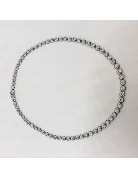 Gargantilla riviere de oro blanco y brillantes.