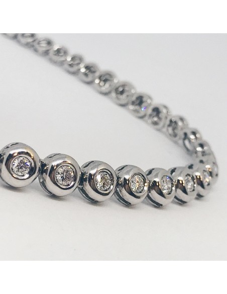 Gargantilla riviere de oro blanco y brillantes.