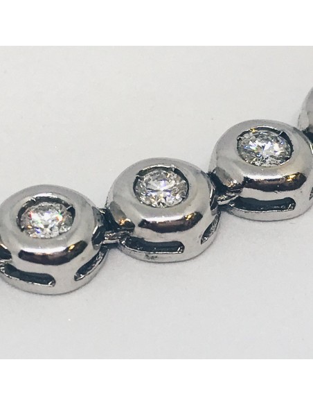 Gargantilla riviere de oro blanco y brillantes.