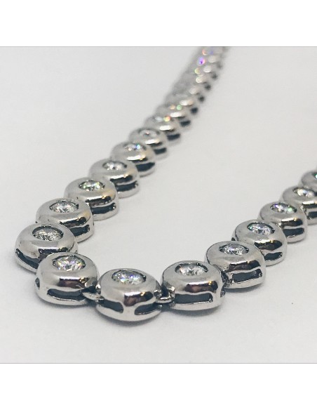 Gargantilla riviere de oro blanco y brillantes.