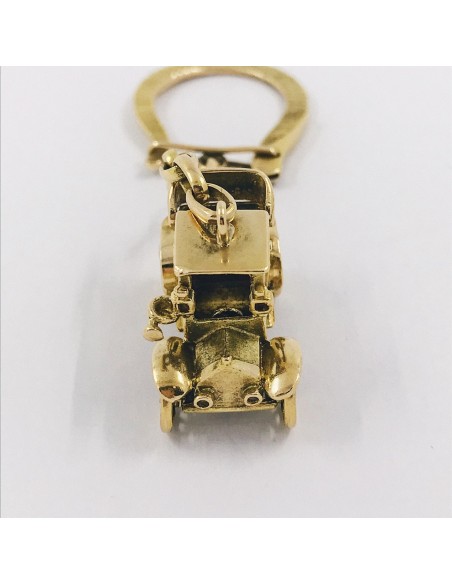Llavero con forma de coche en oro 18kt