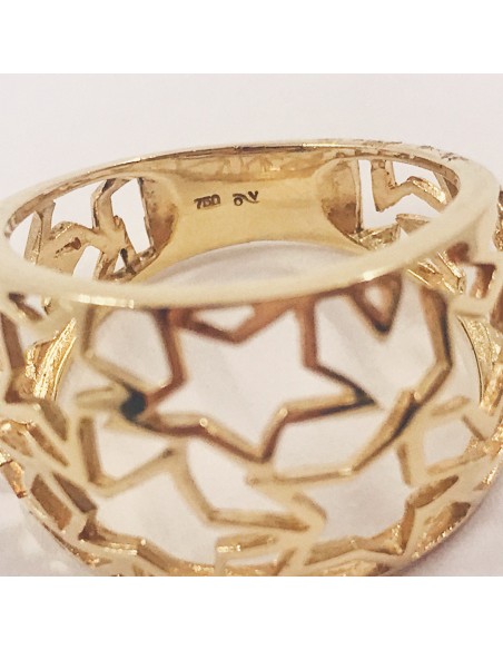 Anillo de oro 18kt. con estrellas.