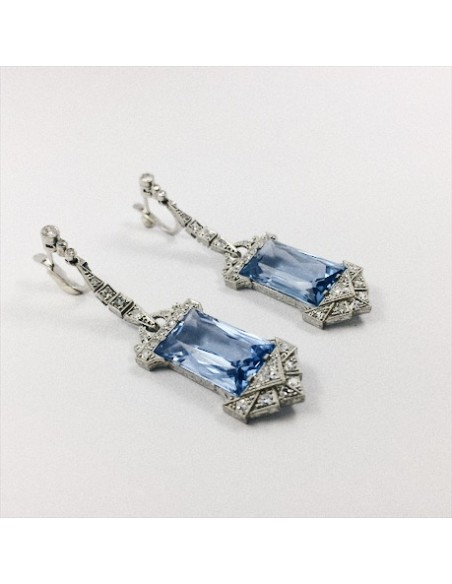 Pendientes art-decÃ³ en oro blanco, brillantes y topacios