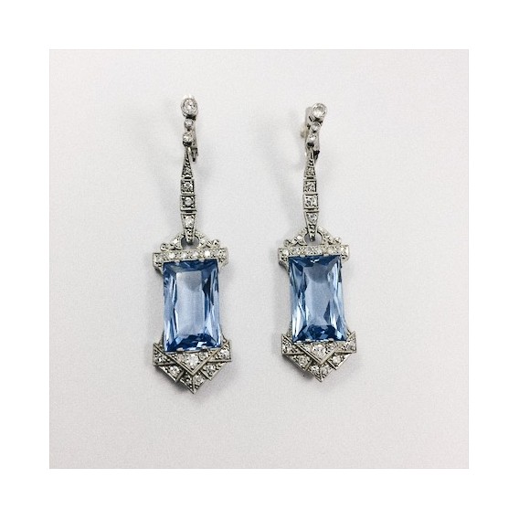 Pendientes art-decÃ³ en oro blanco, brillantes y topacios