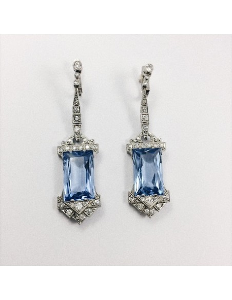 Pendientes art-decÃ³ en oro blanco, brillantes y topacios