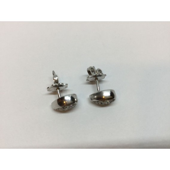 Pendientes en oro blanco y brillantes.