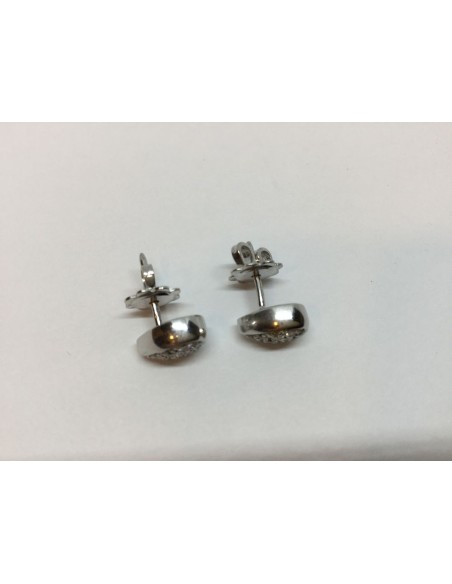 Pendientes en oro blanco y brillantes.