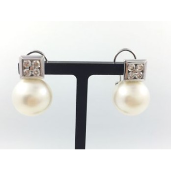 Pendientes tu y yo en oro blanco, brillantes y perla cultivada