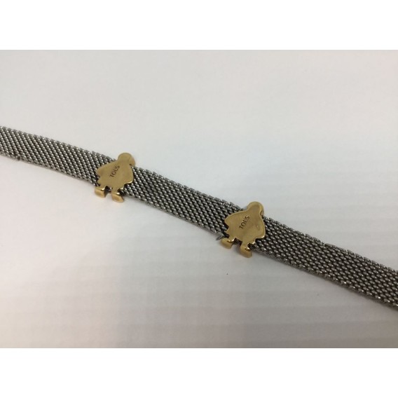Pulsera Tous de malla de acero con cierre y motivos en oro.