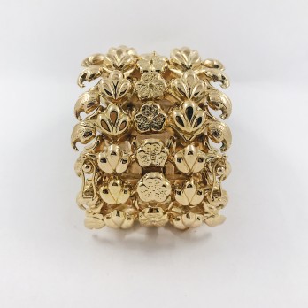 Pulsera ancha troquelada oro