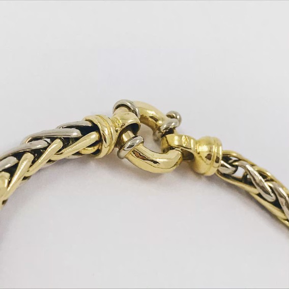 Pulsera trenzada en oro bicolor de 18kt
