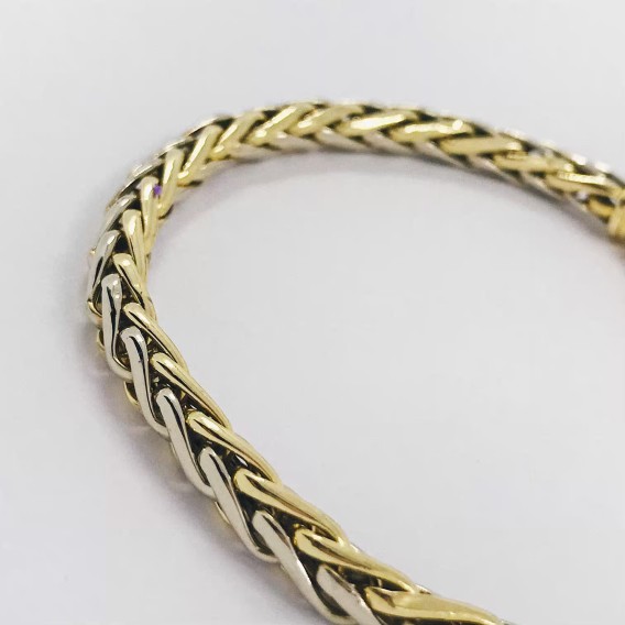 Pulsera trenzada en oro bicolor de 18kt