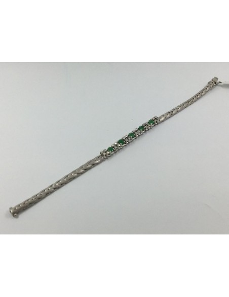 Pulsera en oro blanco mate con centro de brillantes y esmeraldas