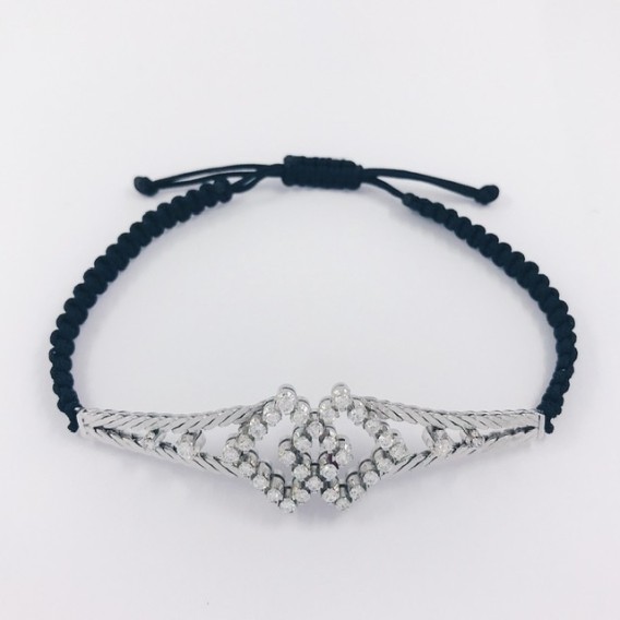 Pulsera en oro blanco con centro de brillantes