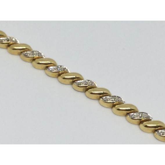 Pulsera de oro amarillo y brillantes centrales