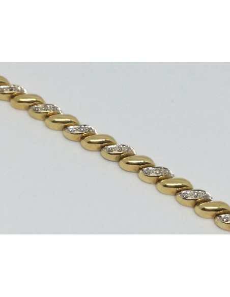 Pulsera de oro amarillo y brillantes centrales