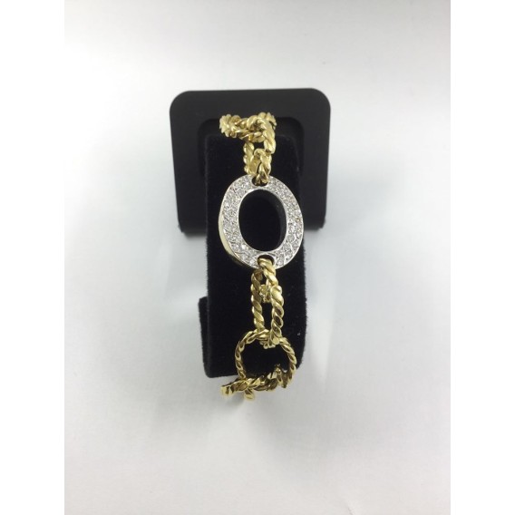 Pulsera en oro amarillo con centro de brillantes
