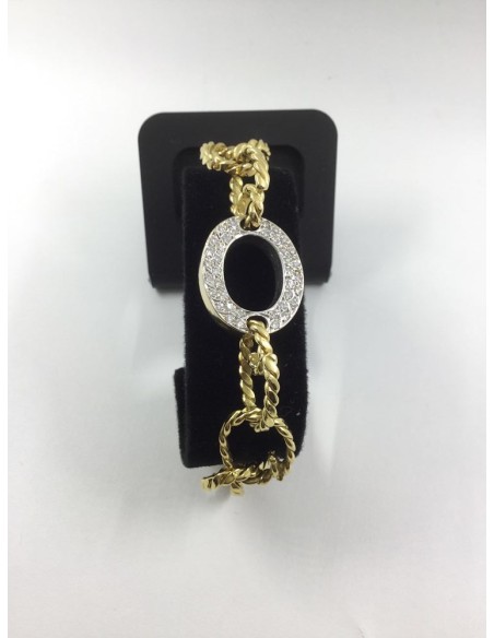 Pulsera en oro amarillo con centro de brillantes