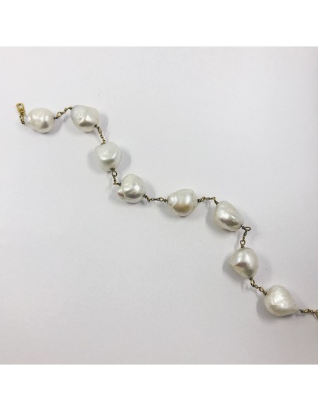 Pulsera en oro 18kt con perlas.