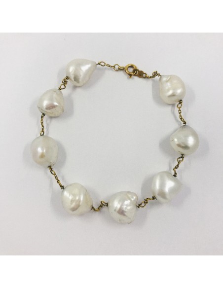 Pulsera en oro 18kt con perlas.
