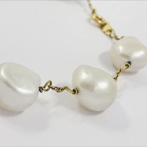 Pulsera en oro 18kt con perlas.