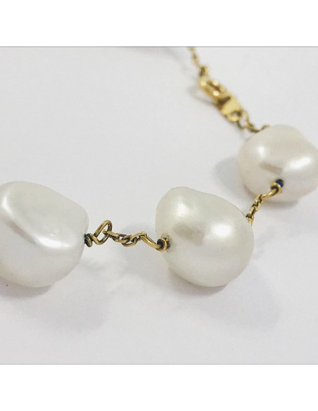 Pulsera en oro 18kt con perlas.