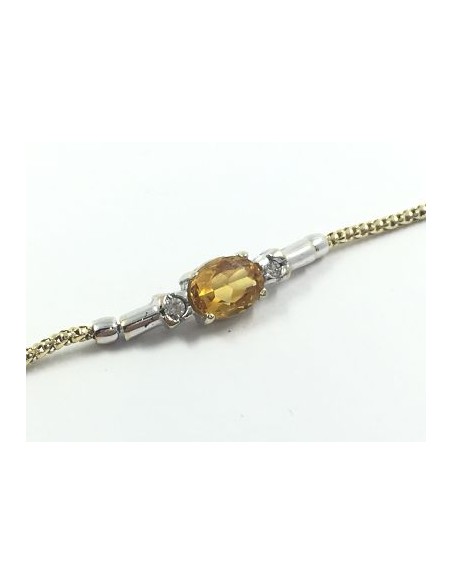 Pulsera de oro con circonitas y piedra de color