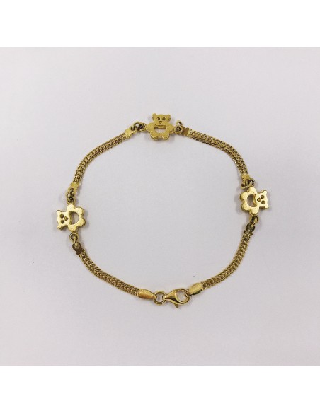 Pulsera con ositos en oro 18kt.