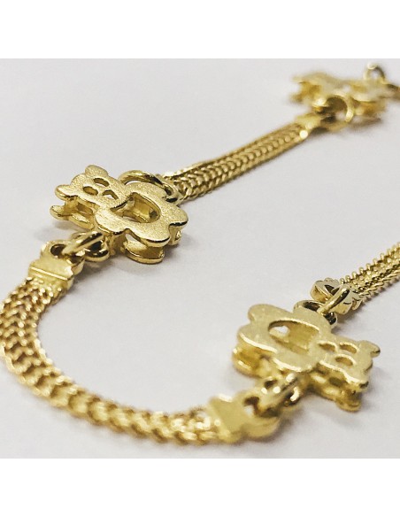 Pulsera con ositos en oro 18kt.