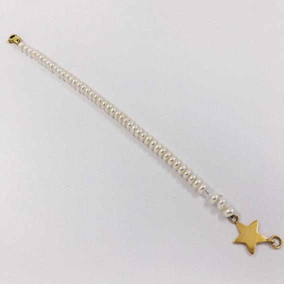 Pulsera de perlas con estrella en oro 18kt.