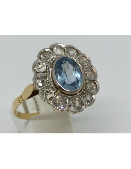 Antigua sortija rosetÃ³n en oro con con brillantes y topacio central