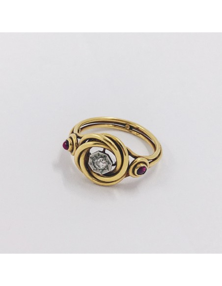 Anillo en oro 18kt con brillante y piedra roja