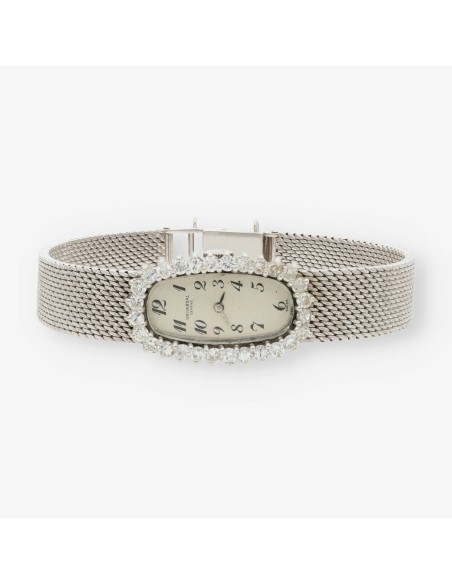 Reloj universal para dama en oro blanco 18kt