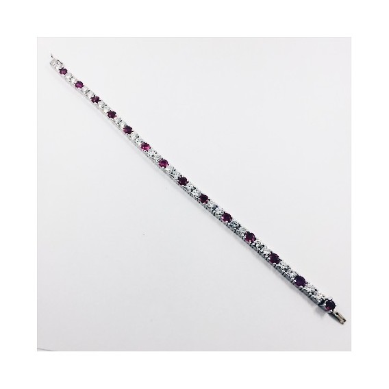 Pulsera riviÃ¨re en oro blanco, diamantes y piedras de color