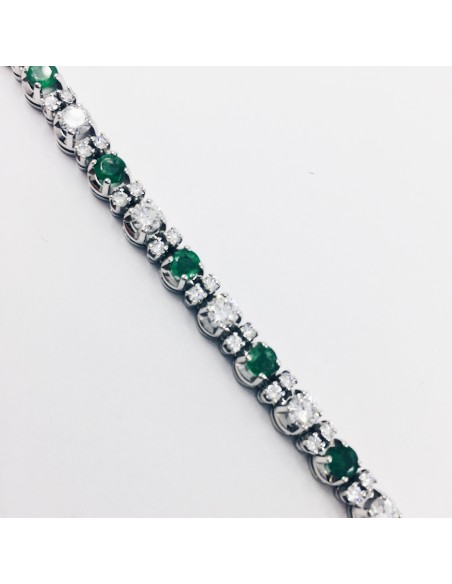 Pulsera de oro blanco con esmeraldas y brillantes