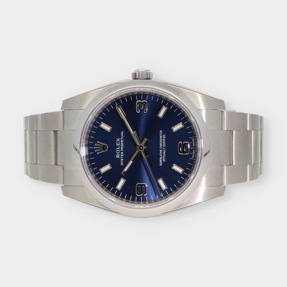 Rolex Oyster Perpetual 114200 caja y documentos
