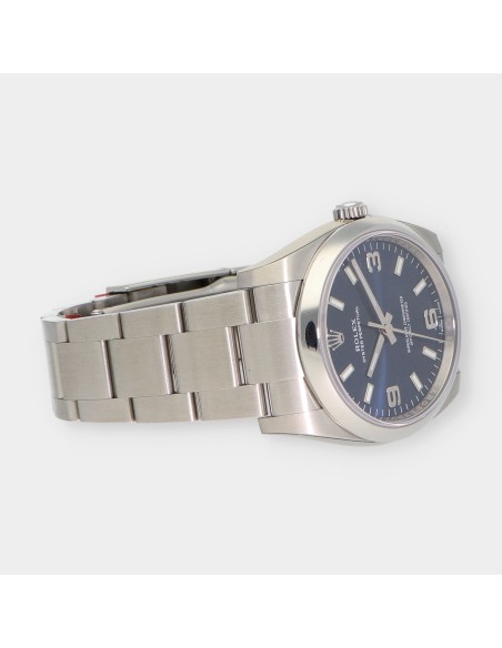 Rolex Oyster Perpetual 114200 caja y documentos