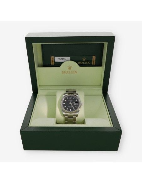 Rolex Oyster Perpetual Date 115234 Caja y Documento
